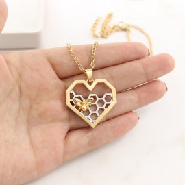 Collier en forme nifd d'abeille avec pendentif coeur or